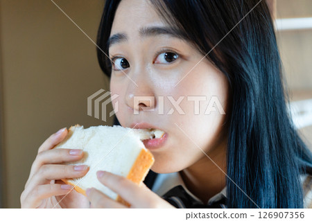 School girls who eat bread School girls who eat bread 126907356