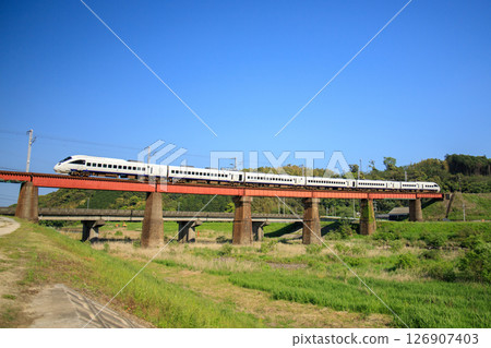 885 series express train crossing the Yasaka River (JR Kyushu) 126907403