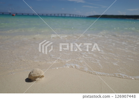 White sand beach and blue sea White sand beach and blue sea 126907448