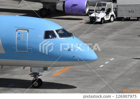 Airplane and sky 126907975