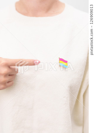 Pansexual Visibility Day and Panromantic May Awareness Day and LGBT pride month concept. hand holding pink, yellow and blue heart shape for Lesbian, Gay, Bisexual, Transgender and Marriage Equality 126909013