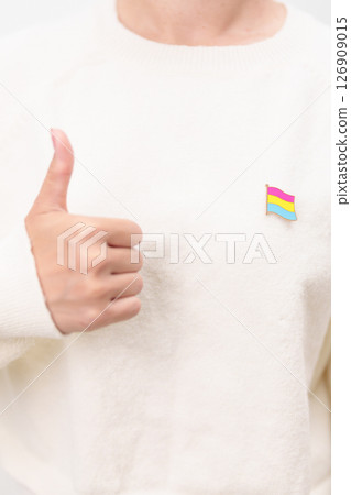 Pansexual Visibility Day and Panromantic May Awareness Day and LGBT pride month concept. hand holding pink, yellow and blue heart shape for Lesbian, Gay, Bisexual, Transgender and Marriage Equality 126909015