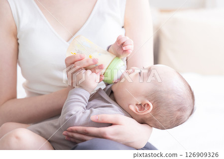 Baby drinking milk Baby drinking milk 126909326