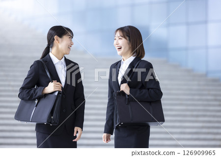Job hunting: Job seekers having a conversation 126909965