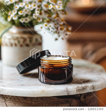 Cosmetic cream in a glass jar. Skin care concept. Background for beauty products 126911343