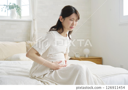 Pregnant woman with stomachache 126911454