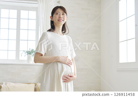 Pregnant woman portrait at home 126911458
