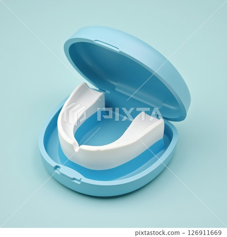 Blue sports mouthguard in open case minimalist composition design Blue sports mouthguard in open case minimalist composition design 126911669