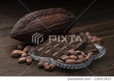 Cocoa pods and cocoa beans and chocolate 126913625