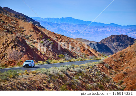 White Car on Desert Road in Nevada Aerial Perspective White Car on Desert Road in Nevada Aerial Perspective 126914321