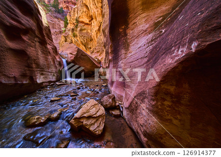 Sandstone Canyon Walls Waterfall and Stream Motion Low Angle Perspective Sandstone Canyon Walls Waterfall and Stream Motion Low Angle Perspective 126914377