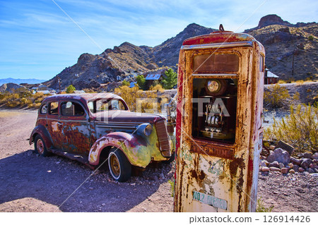 Vintage Desert Scene with Rusted Car and Gas Pump in Nelson Nevada 126914426