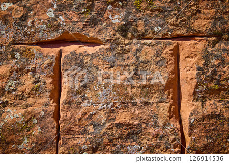 Weathered Sandstone Blocks with Lichen and Moss Close Up Texture Eye Level View 126914536