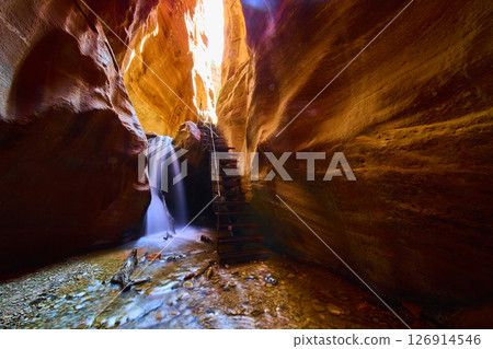 Kanarra Creek Waterfall and Ladder in Slot Canyon Vertical Low Angle View 126914546