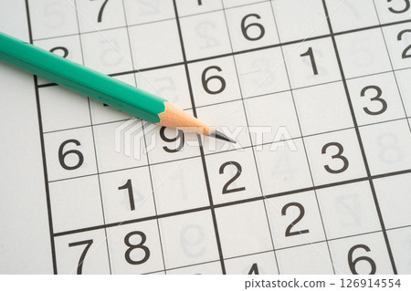 Sudoku puzzle game playing to challenge brain. 126914554