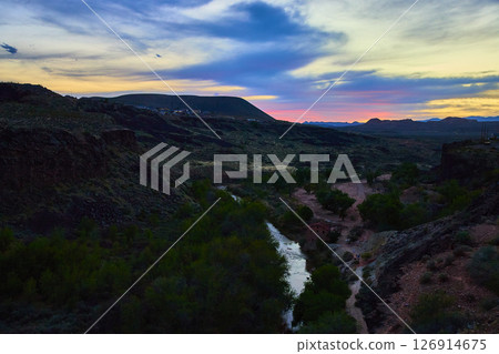 Desert Canyon River Sunset with Lush Trees and Cabin Aerial Fly Through Desert Canyon River Sunset with Lush Trees and Cabin Aerial Fly Through 126914675