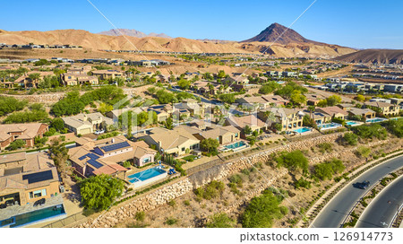 Aerial Luxury Desert Homes with Pools and Mountain View Fly Over Aerial Luxury Desert Homes with Pools and Mountain View Fly Over 126914773