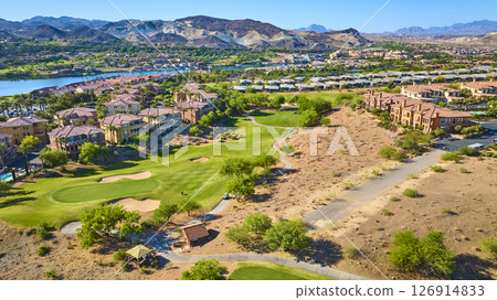 Aerial Golf Course Lakefront Homes and Desert Mountains Fly Over 126914833