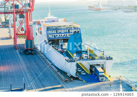 Roll-on roll-off ferry loading vehicles at port terminal, photo Roll-on roll-off ferry loading vehicles at port terminal, photo 126914865