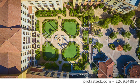 Aerial Mediterranean Courtyard with Fire Pit and Geometric Lawns Top Down View Aerial Mediterranean Courtyard with Fire Pit and Geometric Lawns Top Down View 126914899