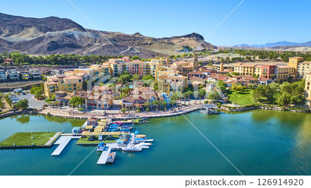 Aerial Waterfront Mediterranean Village and Marina with Desert Mountains 126914920