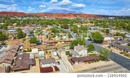 Aerial Suburban Homes and Red Rock Mesas in St George Utah Wide View 126914992