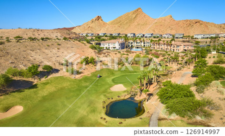 Aerial Golf Course Lush Fairway and Desert Oasis Community Fly Over 126914997