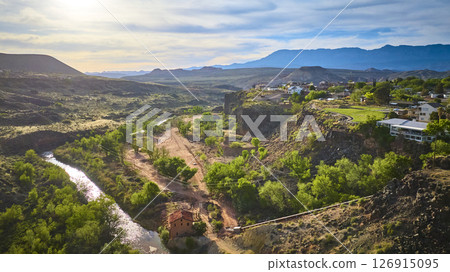 Aerial of Virgin River Cliffs Historic Building and Desert Community Fly Over Aerial of Virgin River Cliffs Historic Building and Desert Community Fly Over 126915095