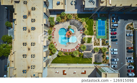 Aerial Resort Pool Tennis Court and Palm Trees Top Down Flyover 126915098