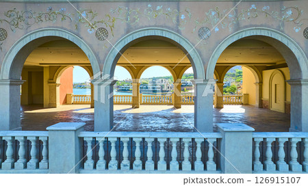 Aerial Fly Through Mediterranean Arches Overlooking Waterfront Villas Terrace 126915107