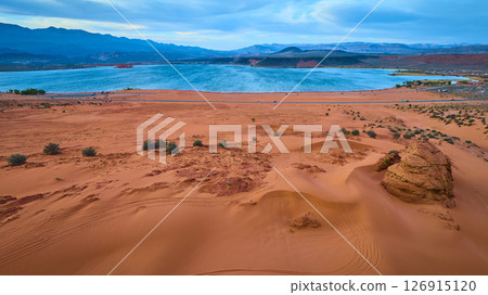 Aerial Red Sand Dunes and Blue Lake at Sand Hollow State Park Fly Over Aerial Red Sand Dunes and Blue Lake at Sand Hollow State Park Fly Over 126915120