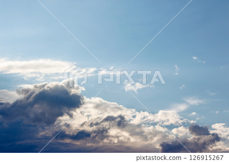 blue sky with cumulus clouds in summer. cloudy weather in the afternoon. meteorology forecast background for wind and cloudiness atmosphere conditions blue sky with cumulus clouds in summer. cloudy weather in the afternoon. meteorology forecast background for wind and cloudiness atmosphere conditions 126915267