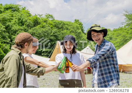 Camping: Men and women toasting 126916278