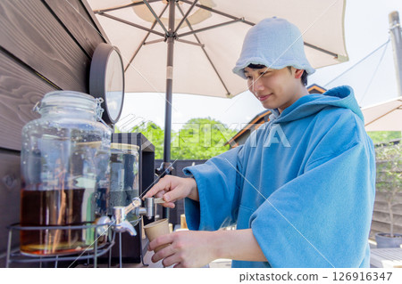 A man hydrating after a sauna 126916347