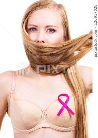 Woman chest in bra, pink cancer ribbon Woman chest in bra, pink cancer ribbon 126917020