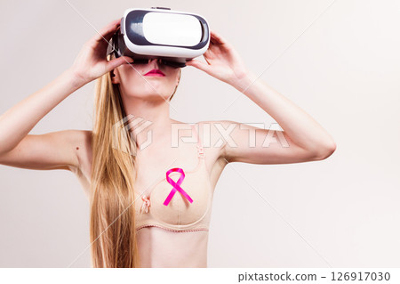 Girl in bra pink cancer ribbon and vr box Girl in bra pink cancer ribbon and vr box 126917030