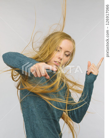 Woman pointing and shaking her finger 126917066