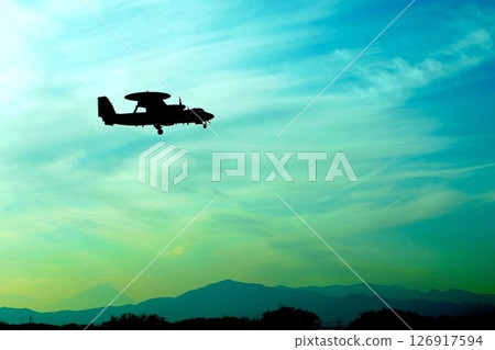 An early warning aircraft preparing to land 126917594