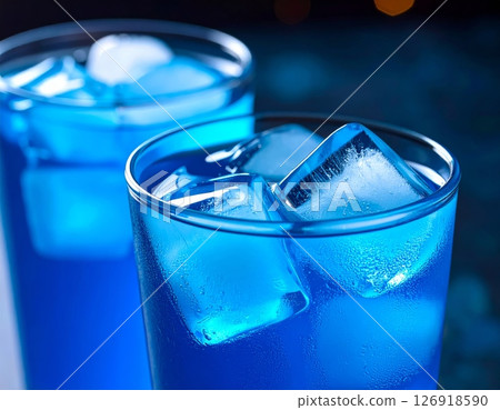 Blue transparent glass with cold water and ice 126918590
