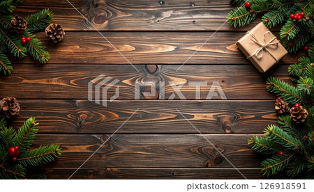 Christmas tree decorations with a kitten on a wooden floor 126918591