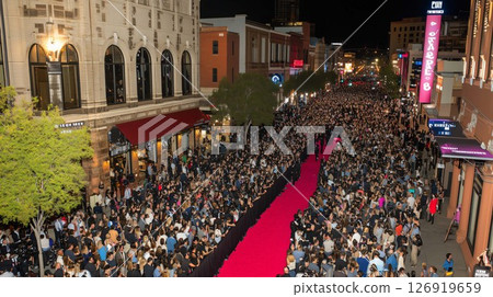 Crowd attending a red carpet event at a film festival 126919659
