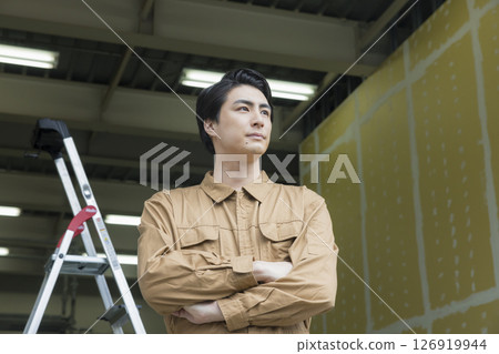 Interior decorator man at work 126919944