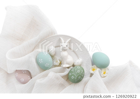 Stylish easter eggs and porcelain hare on linen cloth on white plate. Happy Easter concept. 126920922
