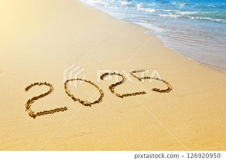 New year 2025 written on sand New year 2025 written on sand 126920950