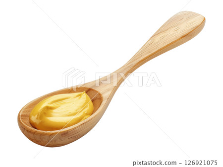 Wooden spoon with mustard 126921075