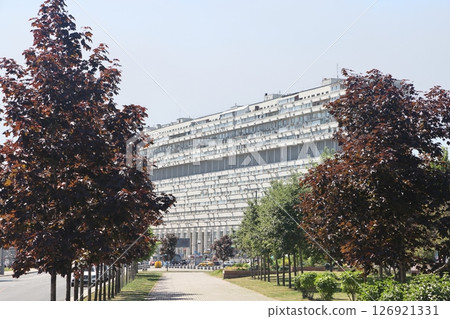 View of an alley and a multi-storey building on Serpukhovskaya Zastava Square, Moscow, June 2022. View of an alley and a multi-storey building on Serpukhovskaya Zastava Square, Moscow, June 2022. 126921331