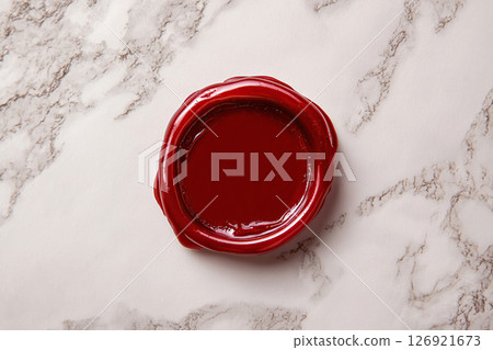 Red wax seal on paper envelope 126921673