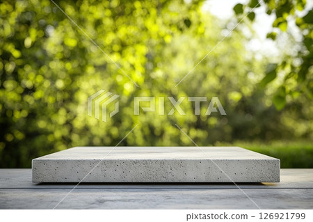 Podium made by natural stone on green nature background Podium made by natural stone on green nature background 126921799