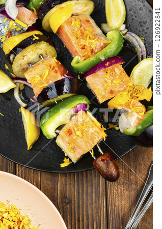 Delicious salmon skewers ready for grilling. 126922841