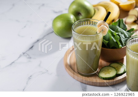 Green smoothie with spinach,banana, apple, and lemon 126922965